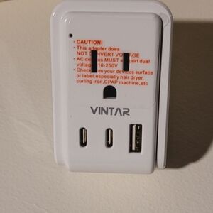 $2/10 White Universal Travel Adapter